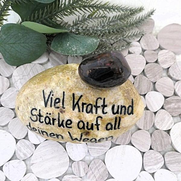 Glücksstein mit einem Trommelstein