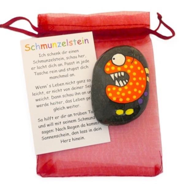Schmunzelstein mit lustigem Monster Gesicht in orange