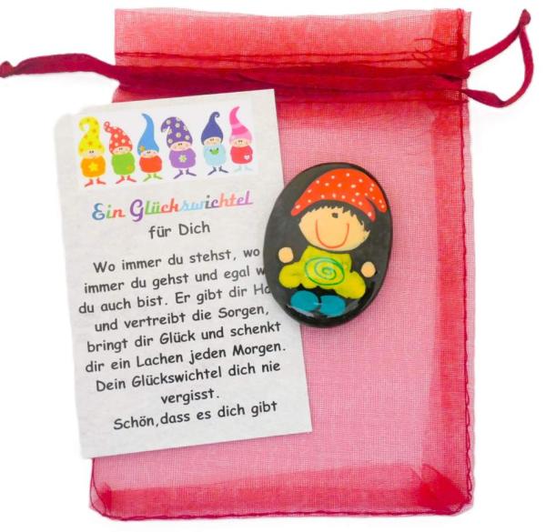 Glückswichtel mit Karte und Säckchen