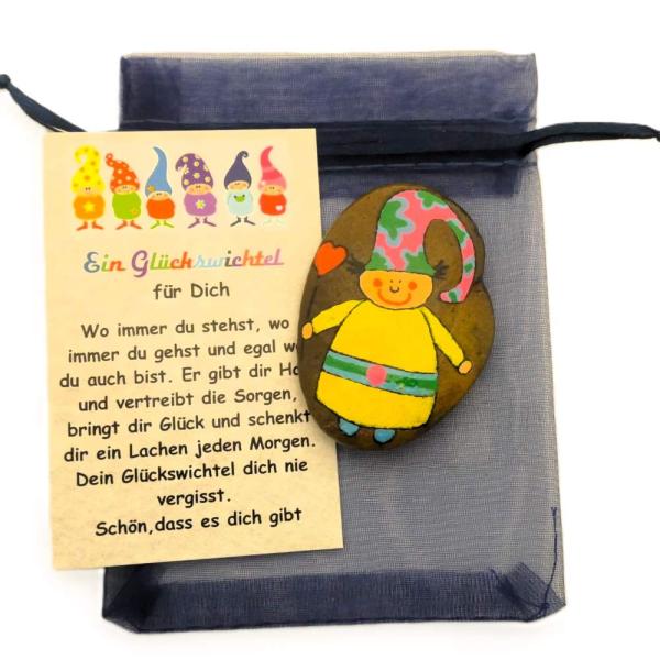 Gelber Glückswichtel mit Geschenkkarte und Organzabeutel